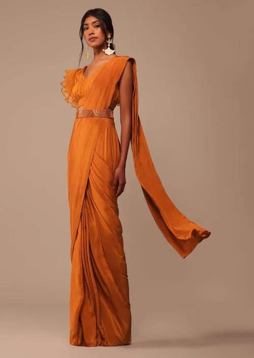 assets/culture/ostren-mirathene/mirathene-02-rust-saree-ruffle.webp