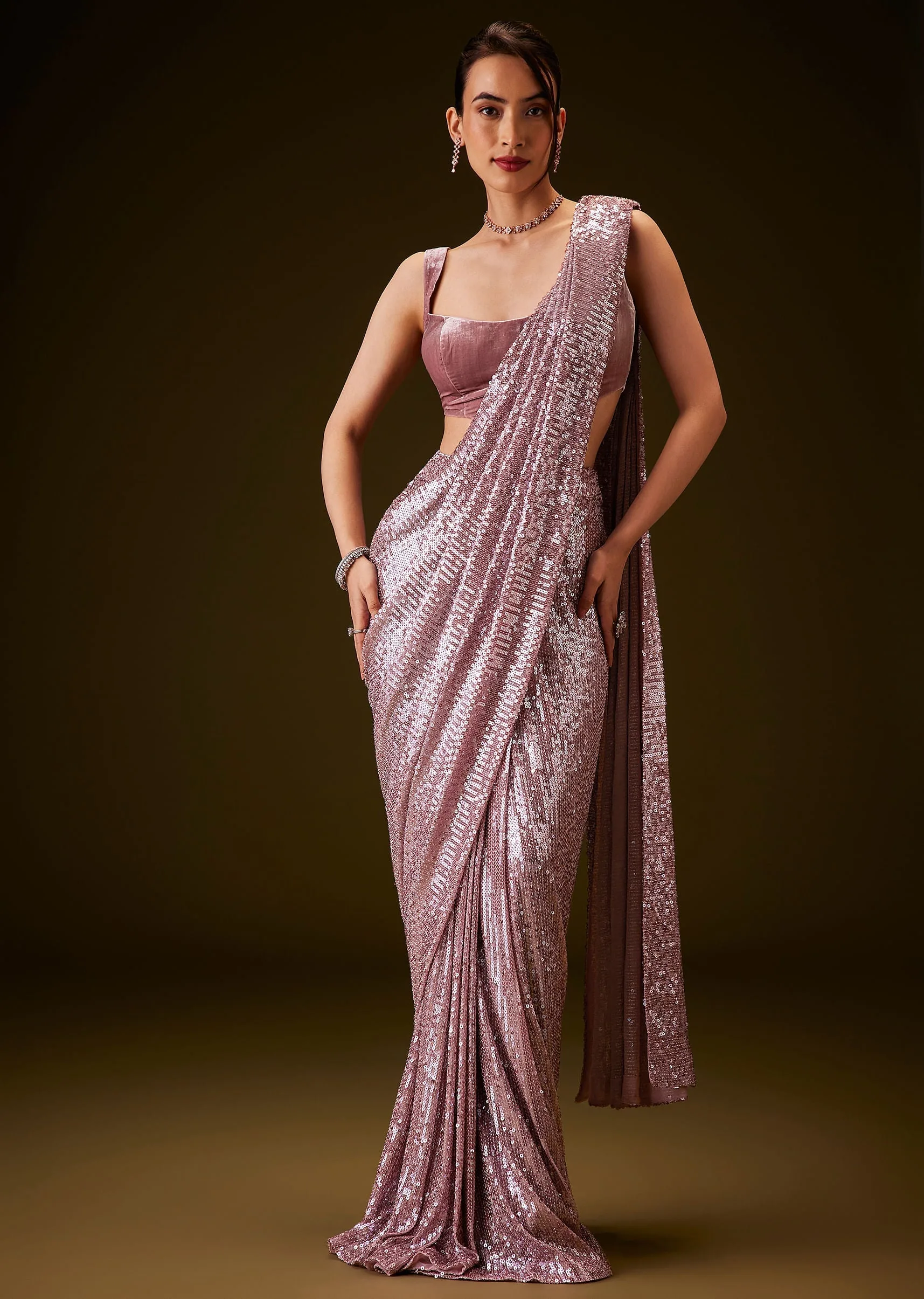 assets/culture/ostren-mirathene/mirathene-03-pink-sequin-saree.webp