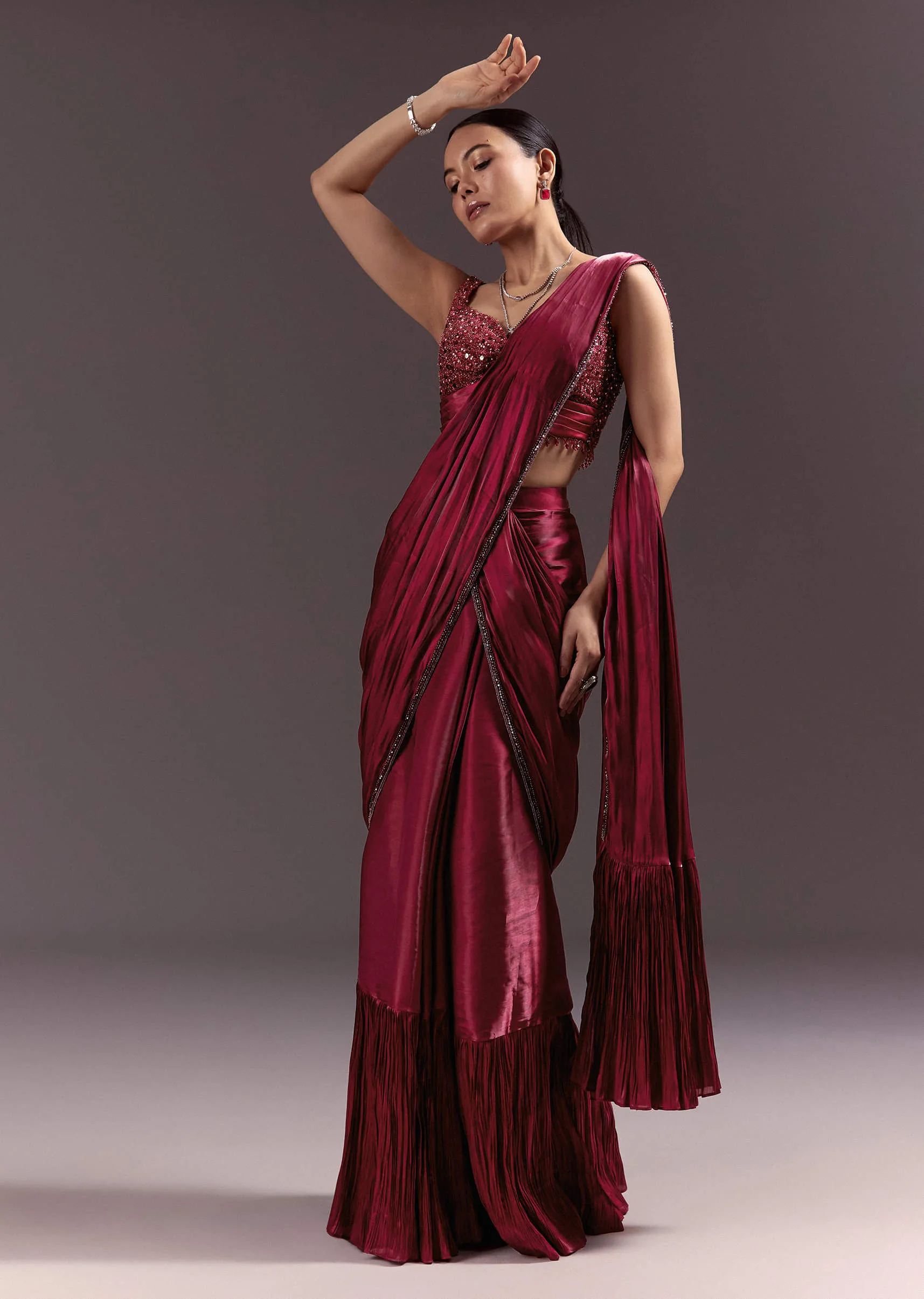 assets/culture/ostren-mirathene/mirathene-04-red-prestitched-saree.webp